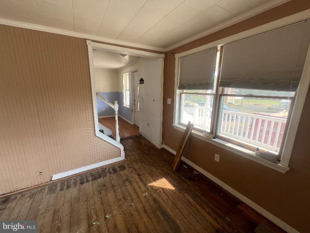 13813 Maple Tree Lane Southwest Cumberland, MD 21502 - Photo 22 of 26 a view of an empty room with a window