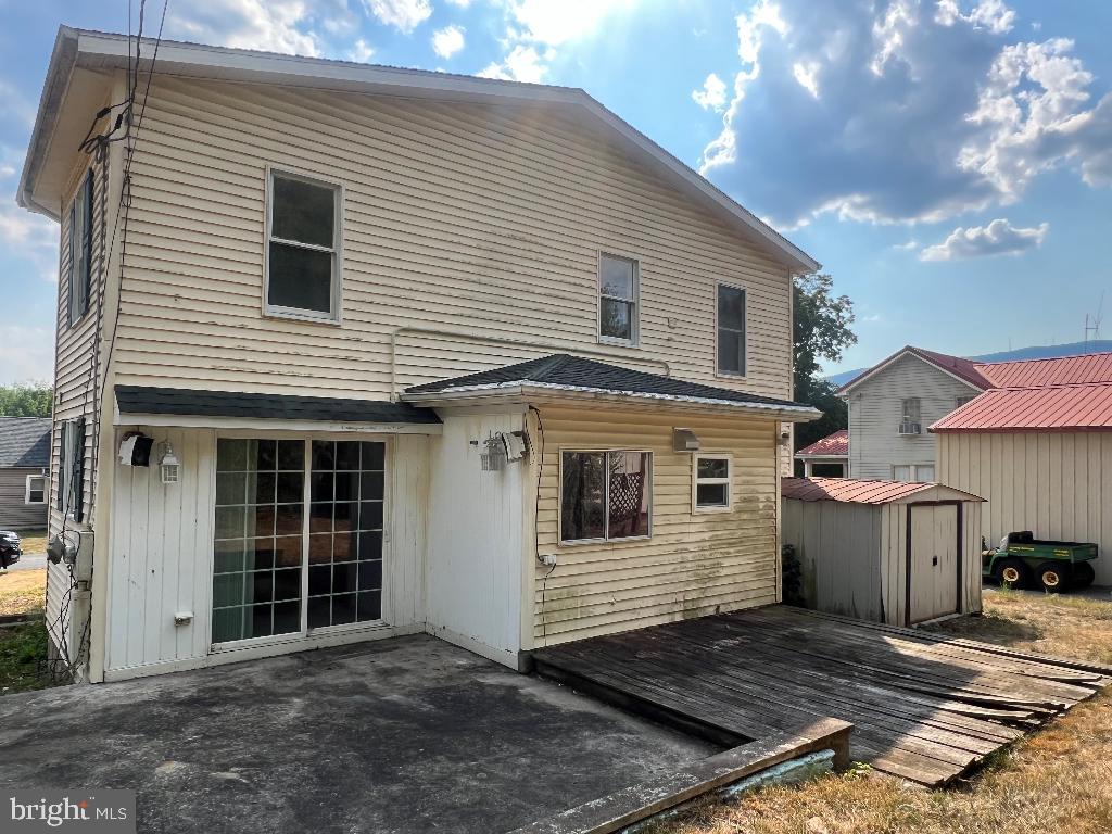 13813 Maple Tree Lane Southwest Cumberland, MD 21502 - Photo 3 of 26 a view of a house with a yard