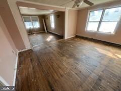 13813 Maple Tree Lane Southwest Cumberland, MD 21502 - Photo 9 of 26 wooden floor in an empty room with a window