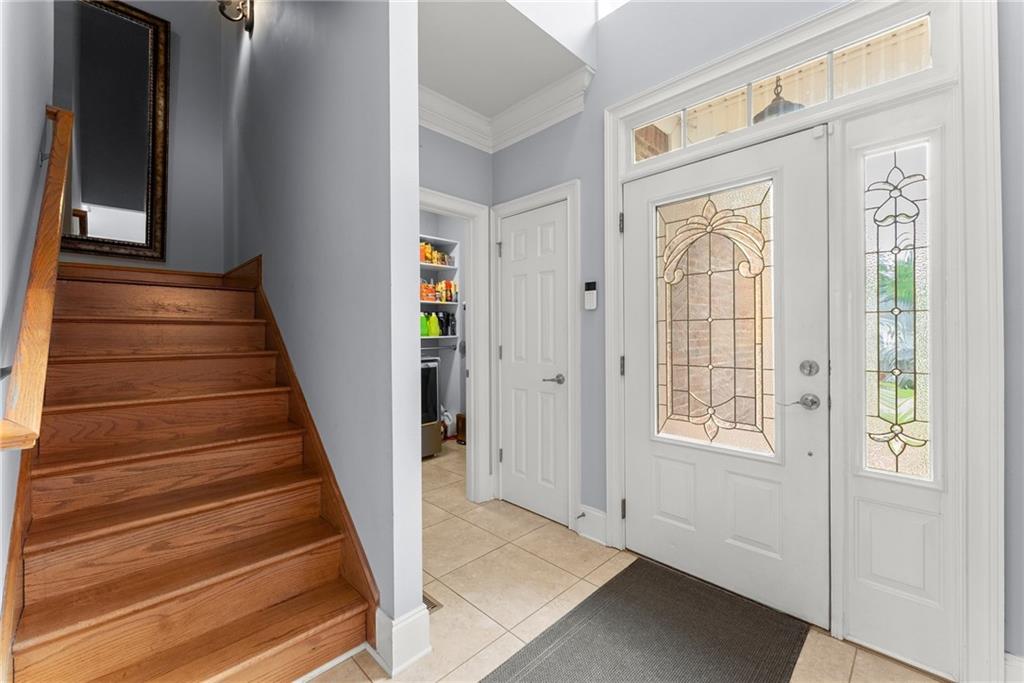 6643 Windvane Point Clermont, GA 30527 - Photo 22 of 88 a view of an entryway with wooden floor