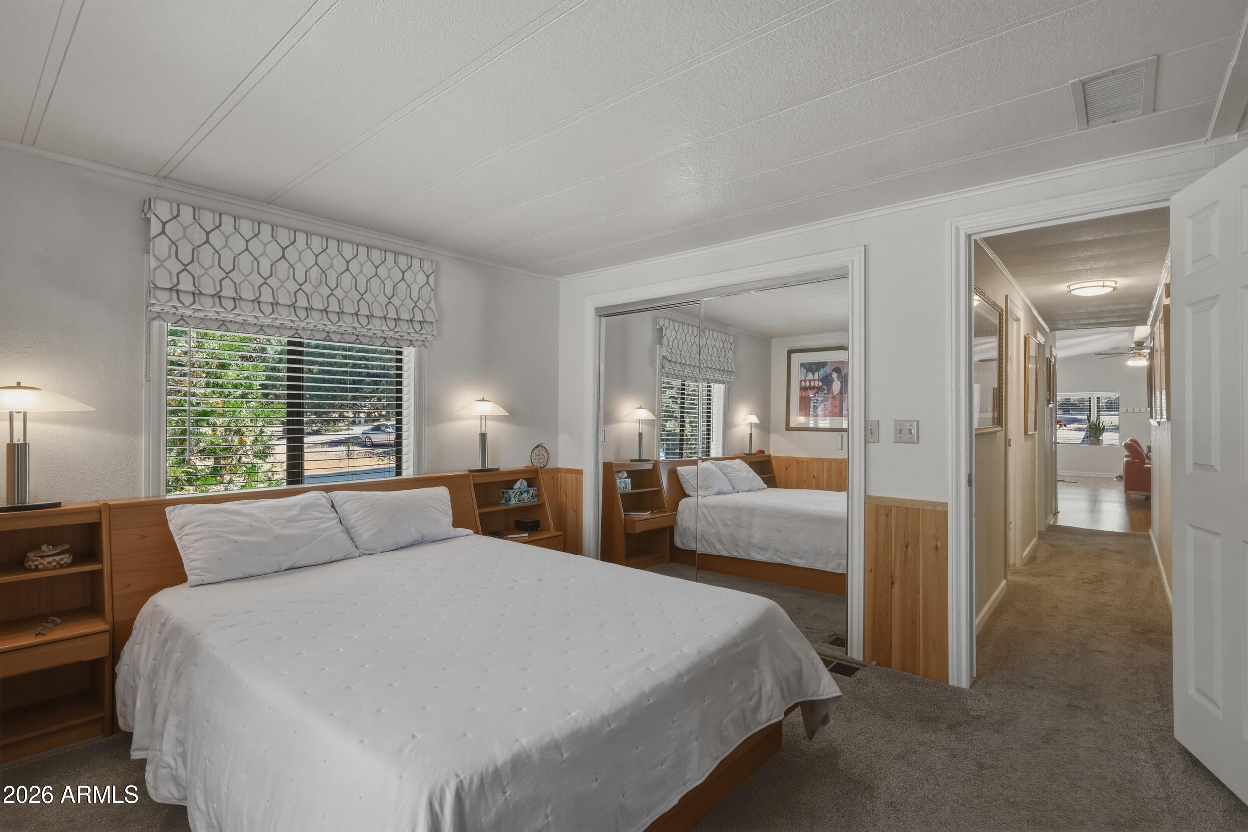 1108 North William Tell Circle Payson, AZ 85541 - Photo 23 of 32 a bedroom with a bed and a large window