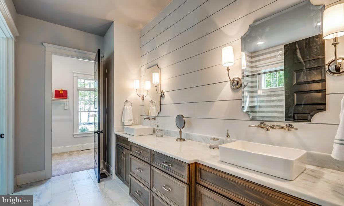 21049 Slab Bridge Road Freeland, MD 21053 - Photo 16 of 22 a bathroom with a sink and a mirror