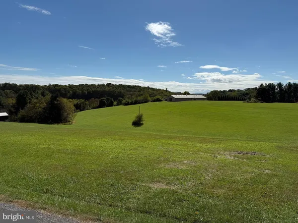 a view of a golf course with a lake