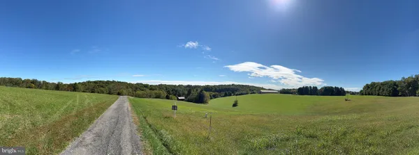 a view of a golf course with a lake