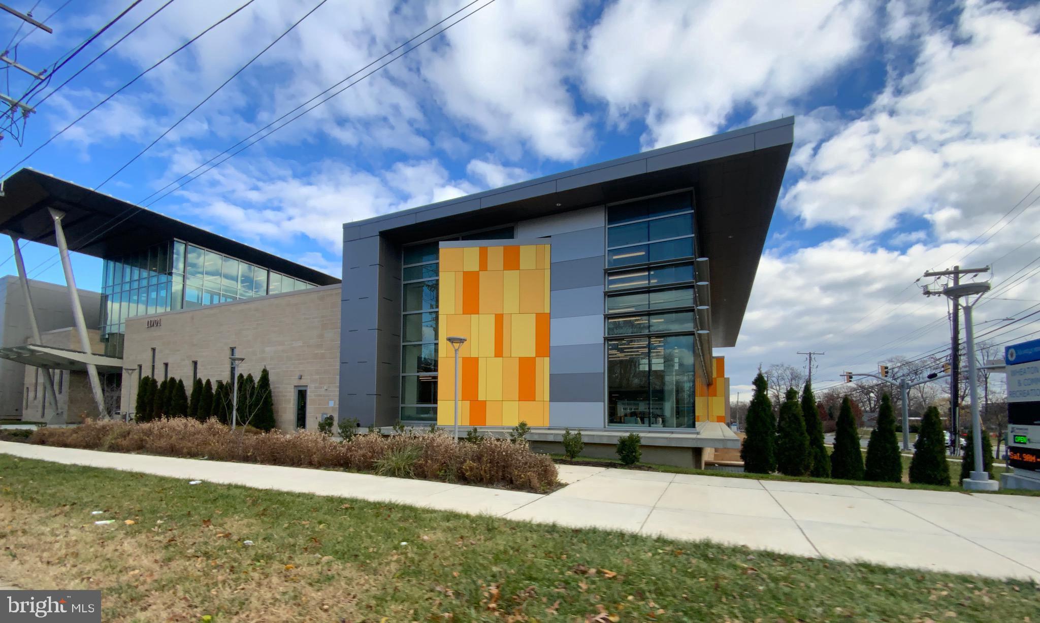 2302 Greenery Lane, Unit 30116 Silver Spring, MD 20906 - Photo 31 of 34 a view of a house with a yard