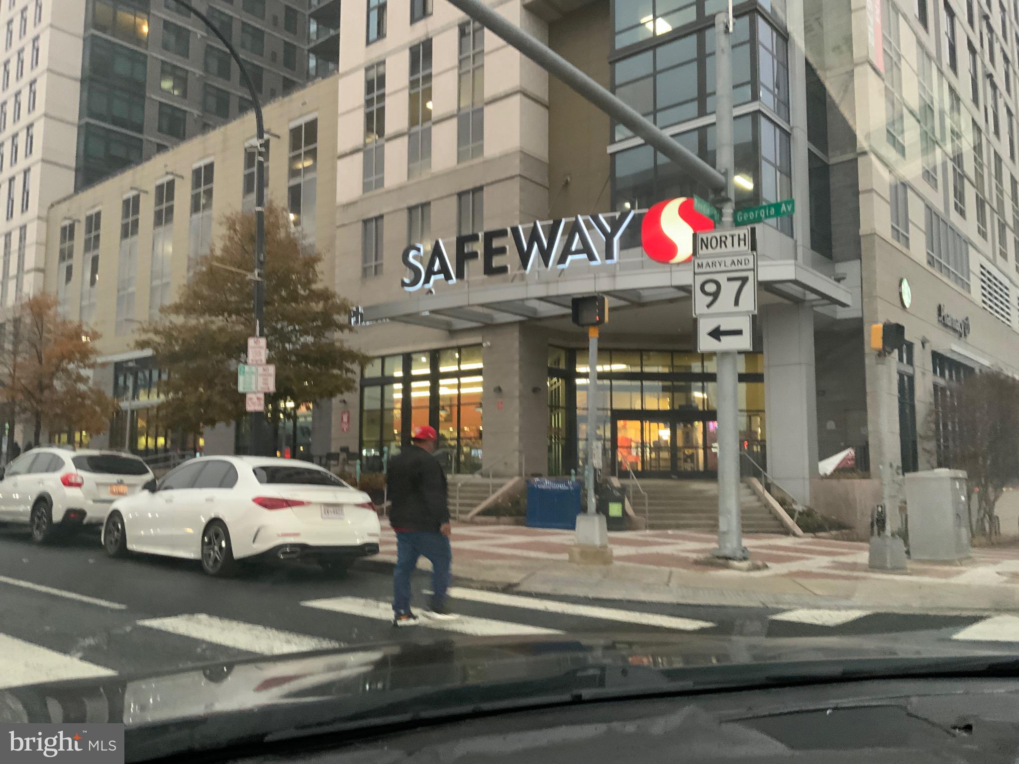 2302 Greenery Lane, Unit 30116 Silver Spring, MD 20906 - Photo 32 of 34 a view of a building with retail shops