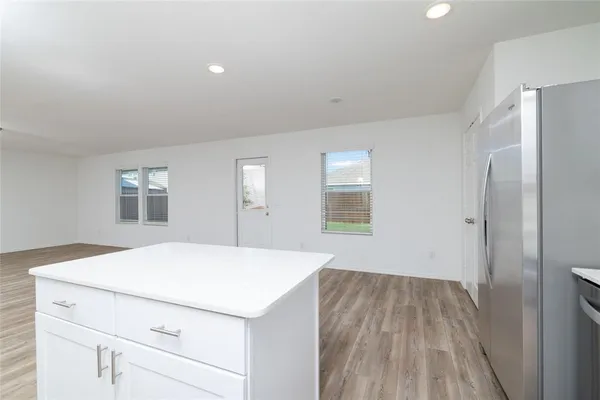 a room with a bed and a window