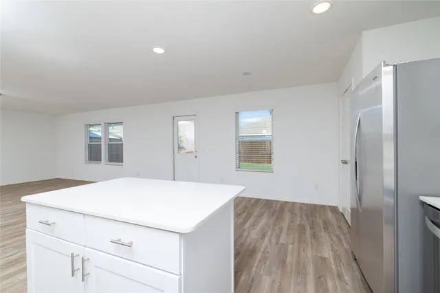 a room with a bed and a window