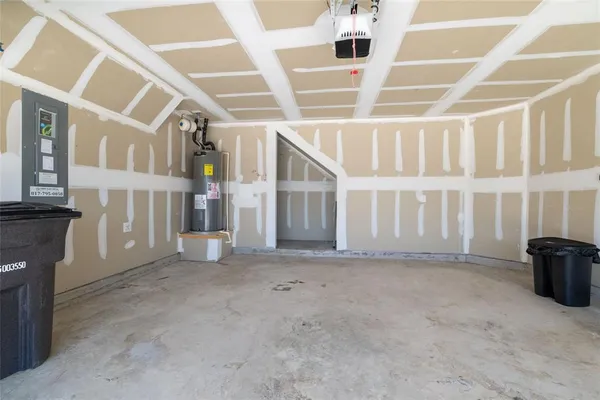 a view of an empty room with stairs