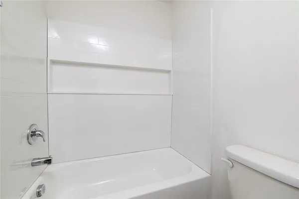 a bathroom with a bathtub