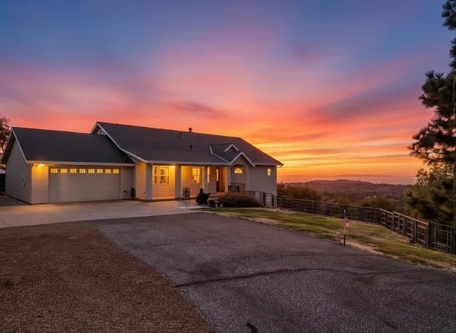 a view of a city with mountains in the background