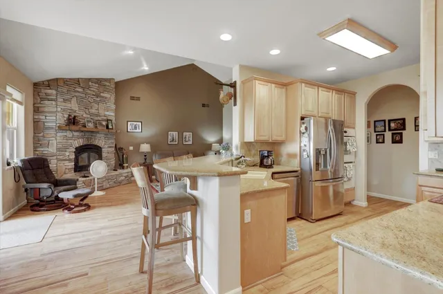 a bedroom with furniture and a flat screen tv