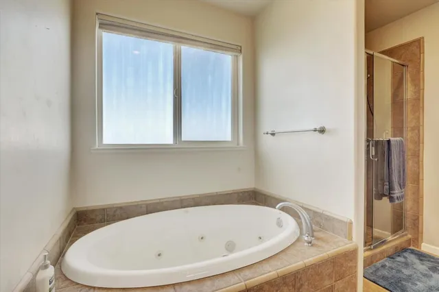 an aerial view of residential house with outdoor space