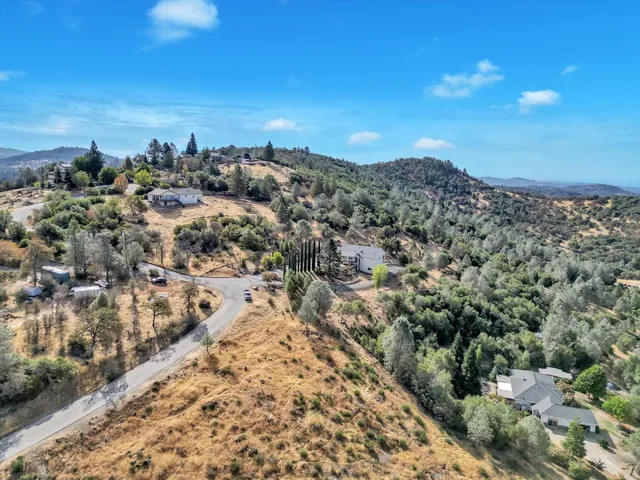 a view of a lake with a yard