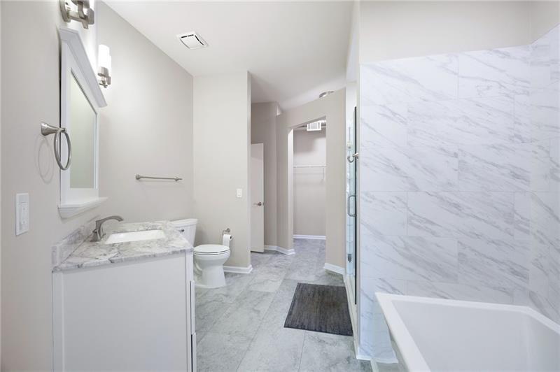 5300 Peachtree Road, Unit 3207 Chamblee, GA 30341 - Photo 15 of 25 a bathroom with a sink and a mirror