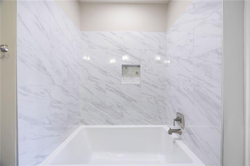 5300 Peachtree Road, Unit 3207 Chamblee, GA 30341 - Photo 17 of 25 a bathroom with a bathtub
