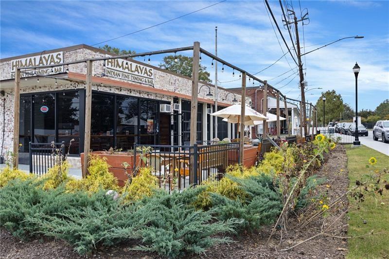 5300 Peachtree Road, Unit 3207 Chamblee, GA 30341 - Photo 21 of 25 a view of a building with a garden