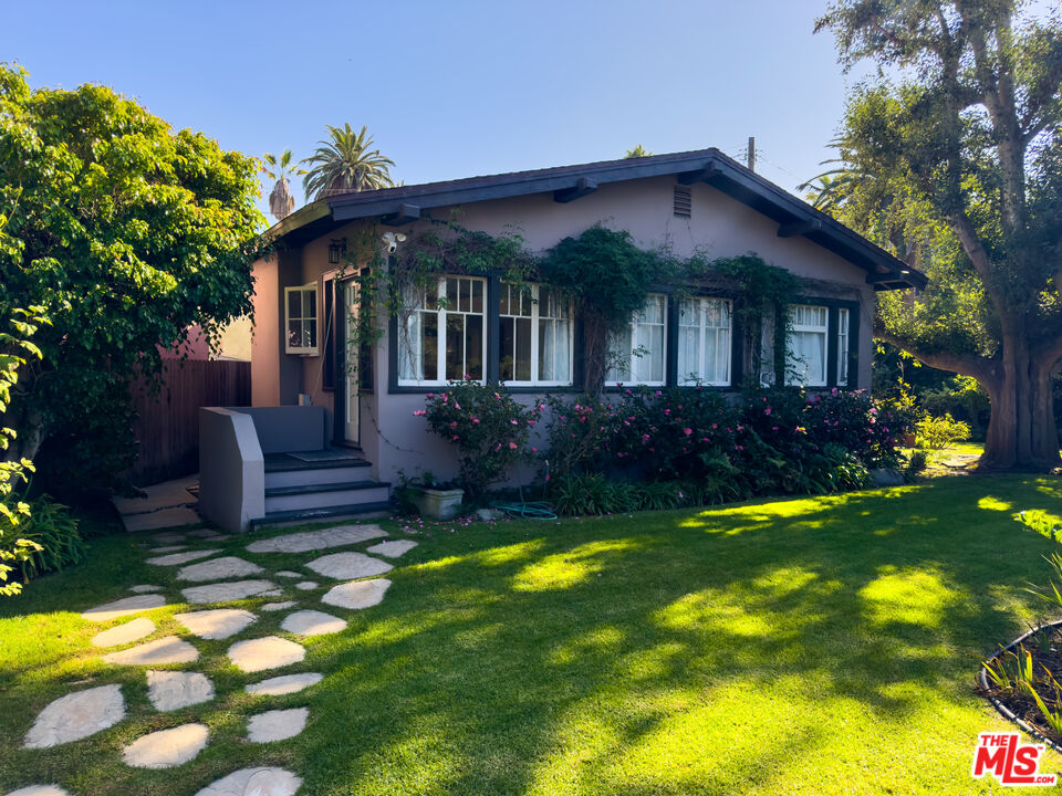 308 Windward Avenue Venice, CA 90291 - Photo 1 of 30 a front view of a house with garden