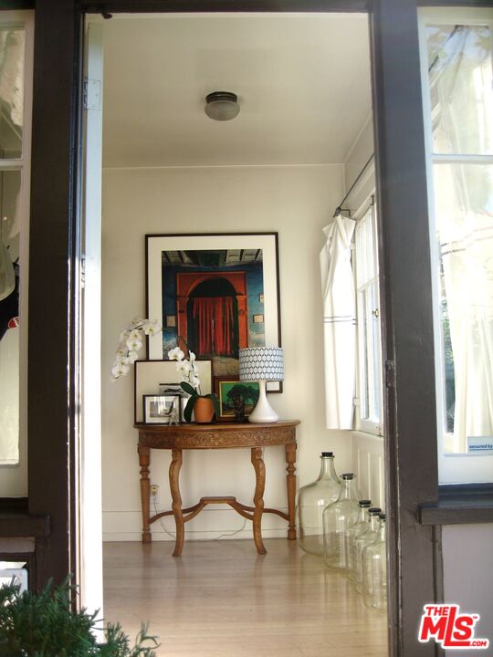 308 Windward Avenue Venice, CA 90291 - Photo 3 of 30 a living room with furniture and a fireplace