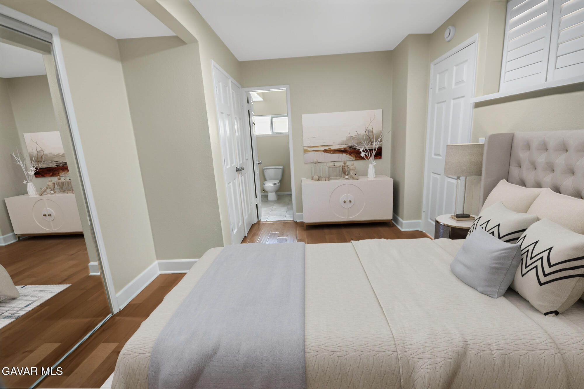 17743 Elizabeth Lake Road Lake Hughes, CA 93532 - Photo 13 of 33 a bedroom with a bed and wooden floor