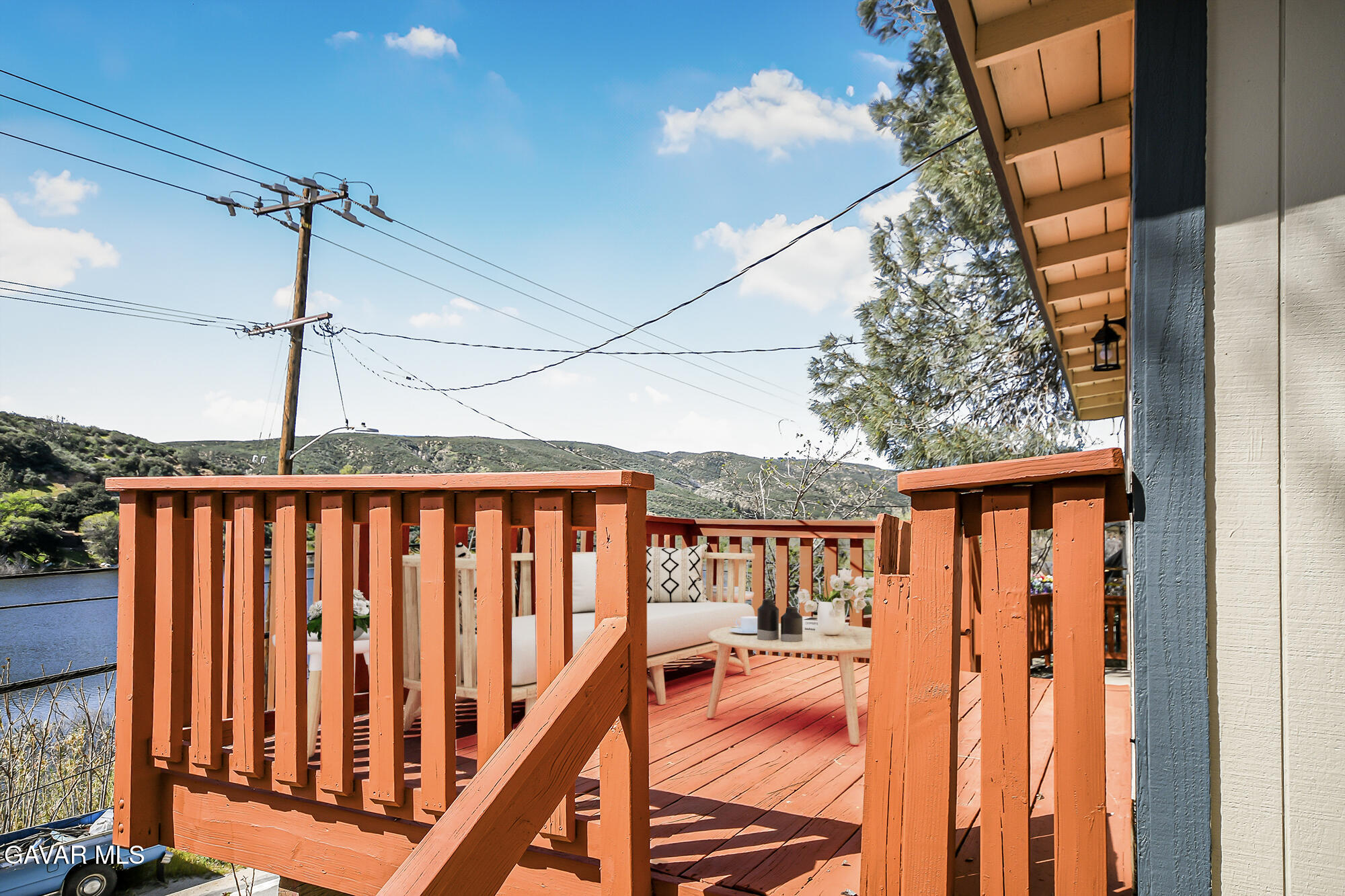 17743 Elizabeth Lake Road Lake Hughes, CA 93532 - Photo 33 of 33 a view of balcony with wooden floor and outdoor seating