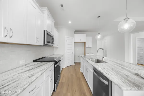 $550,700 | 7053 Marsh Shore Point, Leland, NC 28451