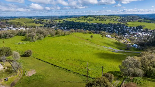 a view of an ocean and houses