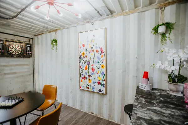 a room with furniture and wooden floor