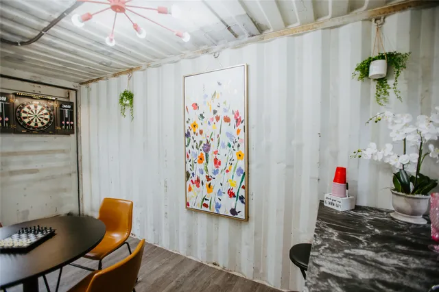 a room with furniture and wooden floor