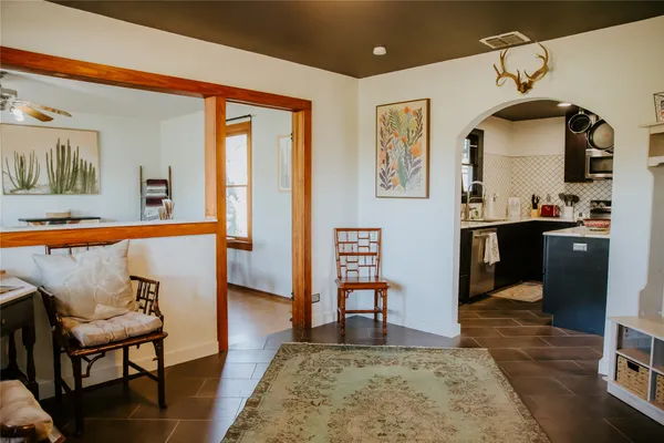 a bedroom with furniture and window