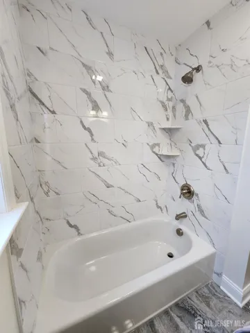 a bathroom with a bathtub