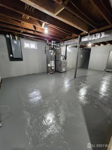 a view of empty room with wooden ceiling