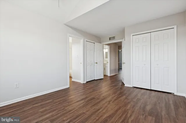 a view of a livingroom with wooden floor