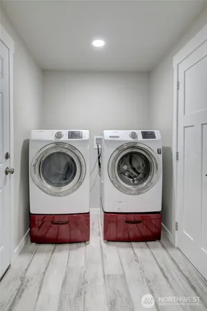a utility room with dryer and washer