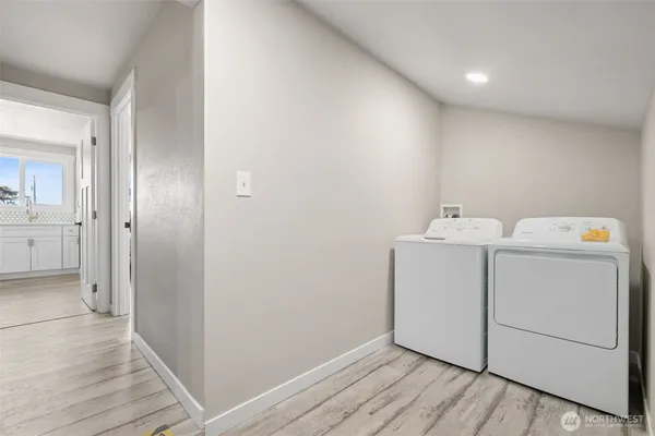 a view of utility room with washer and dryer
