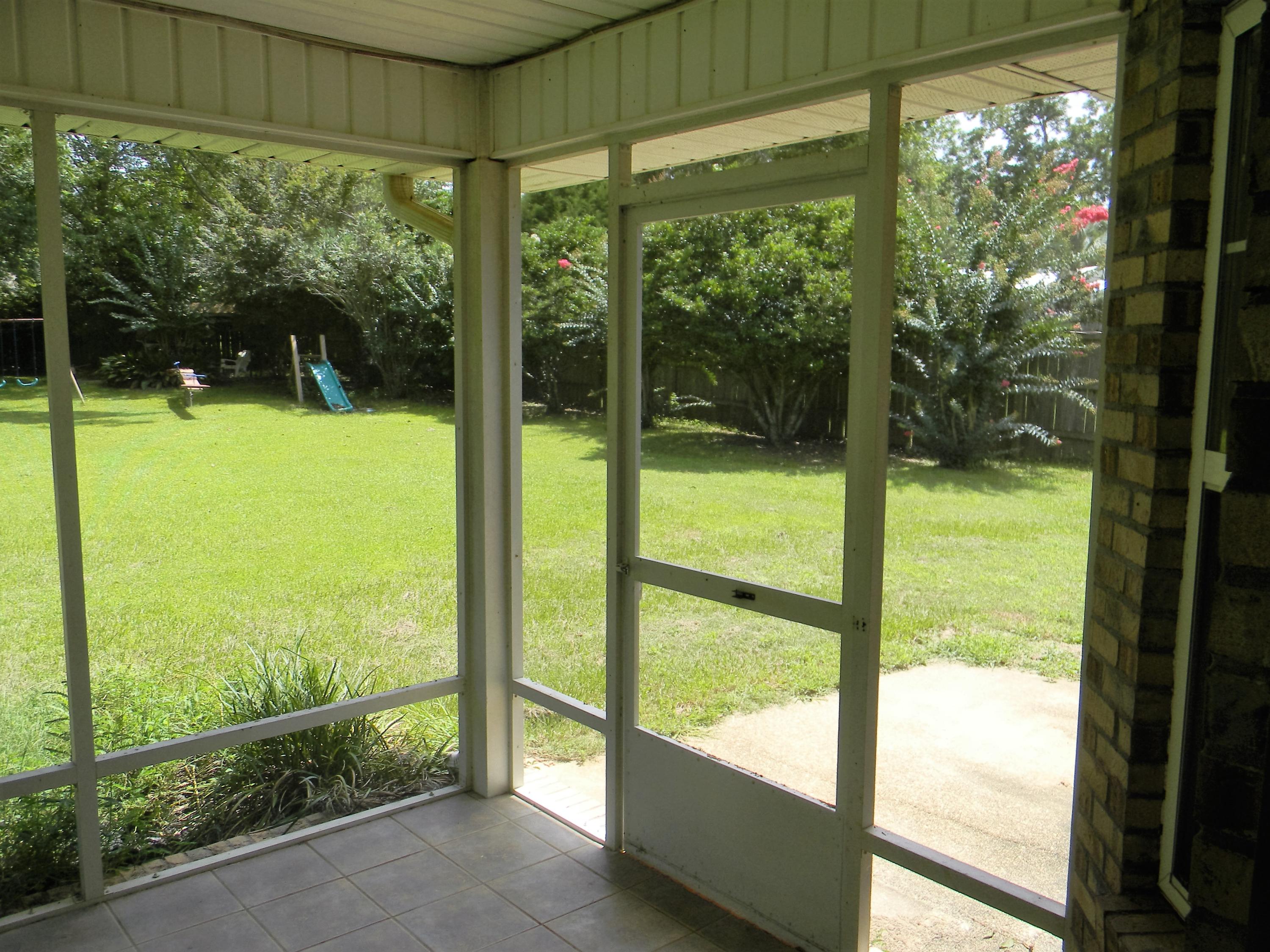 5808 Frances Street Crestview, FL 32539 - Photo 54 of 60 screened in patio 1