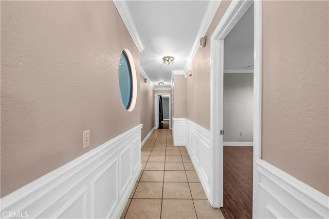 a view of a hallway with a white walls