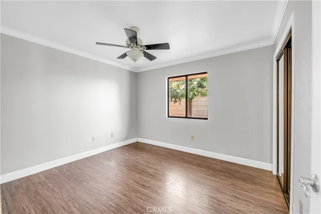 a kitchen with stainless steel appliances granite countertop a refrigerator and a stove