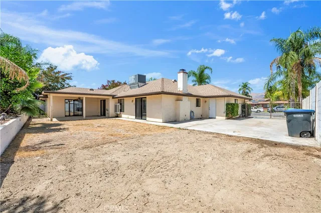 a view of a backyard of a house