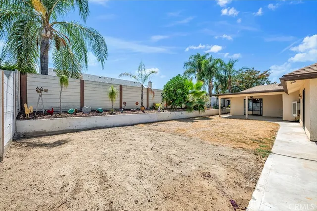a view of a backyard of a house