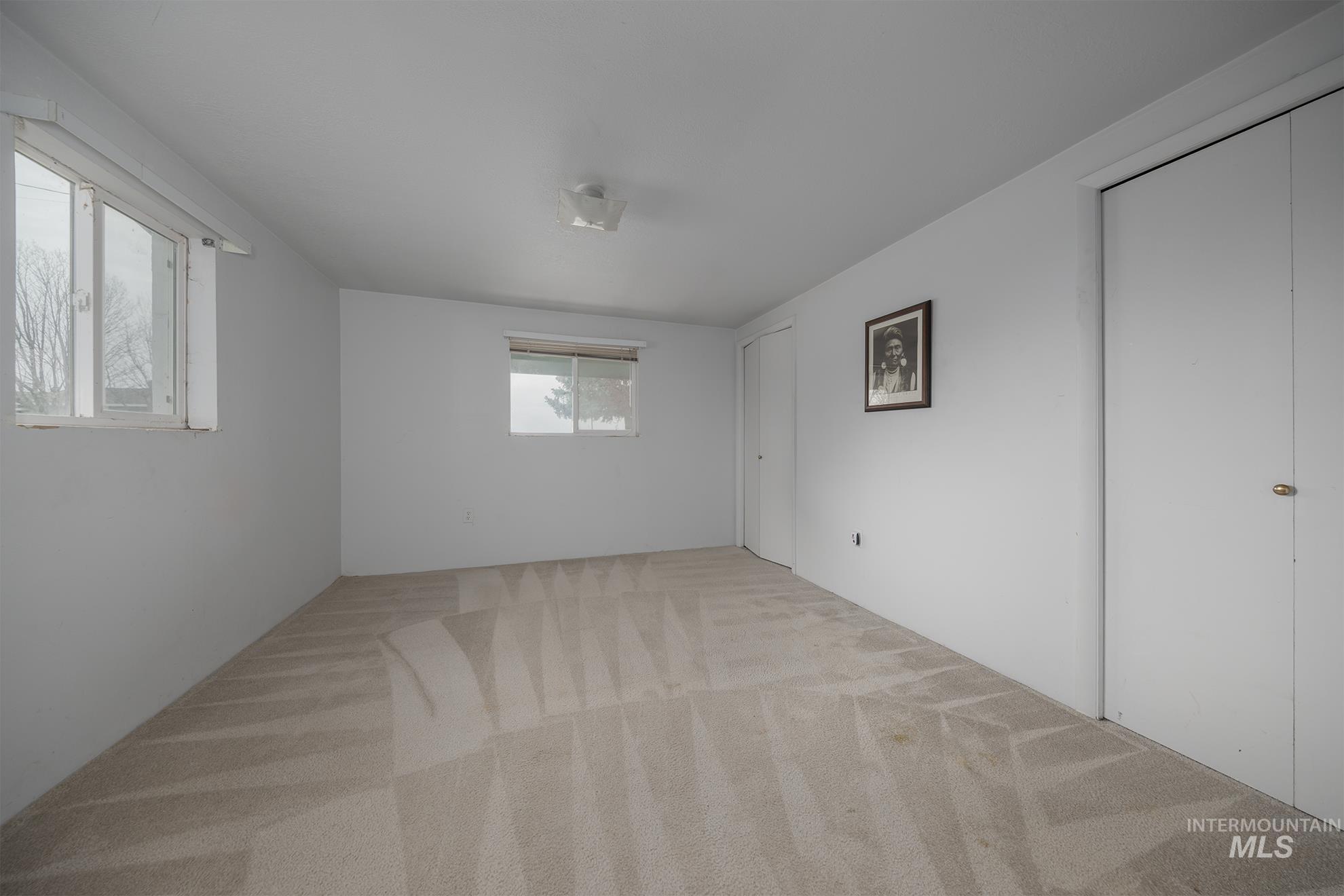 4484 Community Road Ontario, OR 97914 - Photo 13 of 35 Spare room featuring light carpet