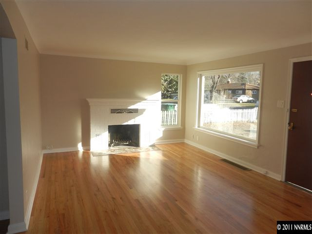 1275 Charles Drive Reno, NV 89509 - Photo 5 of 13 a view of an empty room with wooden floor and a window