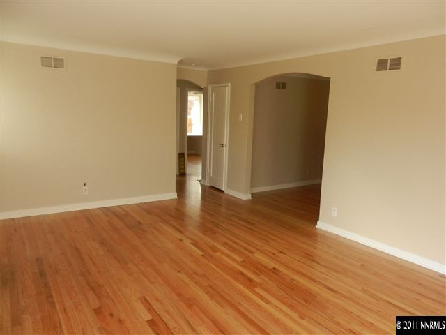 1275 Charles Drive Reno, NV 89509 - Photo 6 of 13 wooden floor in an empty room