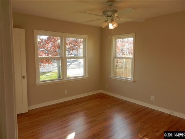 1275 Charles Drive Reno, NV 89509 - Photo 8 of 13 a view of a room with wooden floor and windows