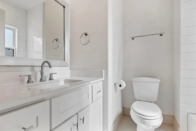 a front view of a house with garage