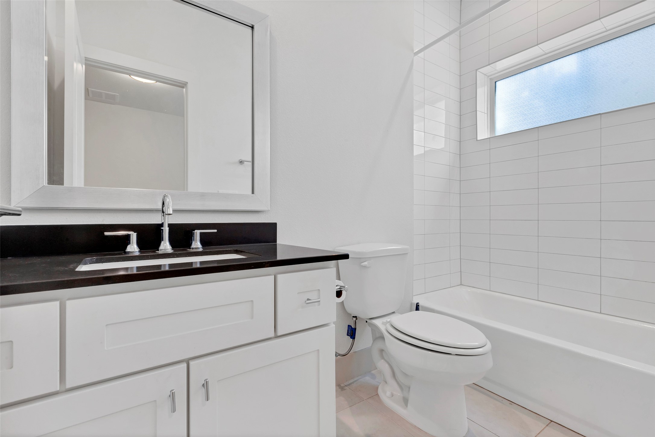 1740 Ojeman Point Lane Houston, TX 77055 - Photo 3 of 20 a bathroom with a sink a toilet and a bathtub