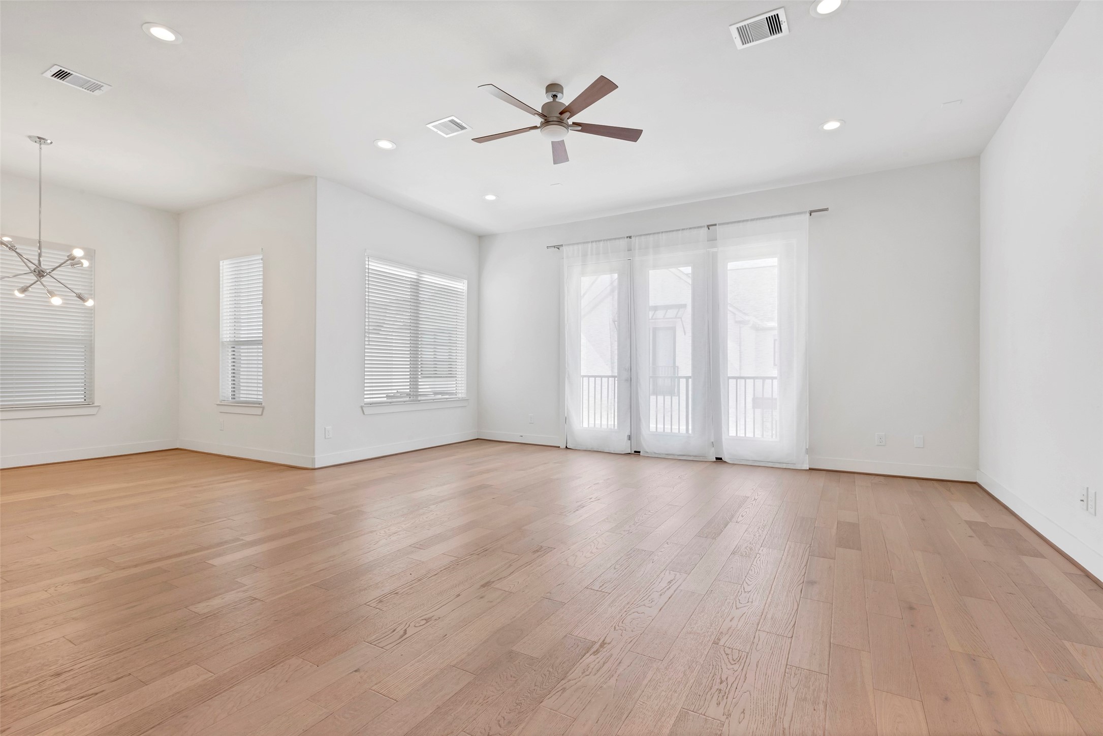 1740 Ojeman Point Lane Houston, TX 77055 - Photo 8 of 20 a view of an empty room with a window