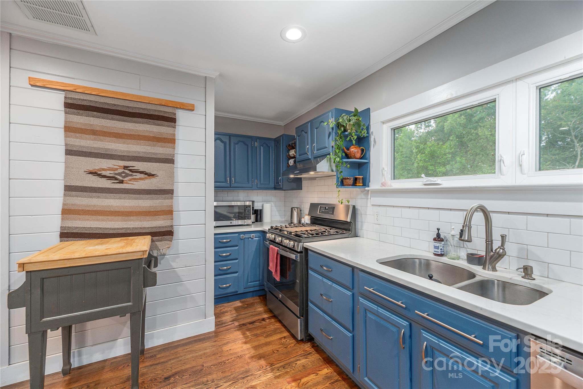 1304 Souther Road Old Fort, NC 28762 - Photo 16 of 48 a kitchen with a sink stove top oven and refrigerator