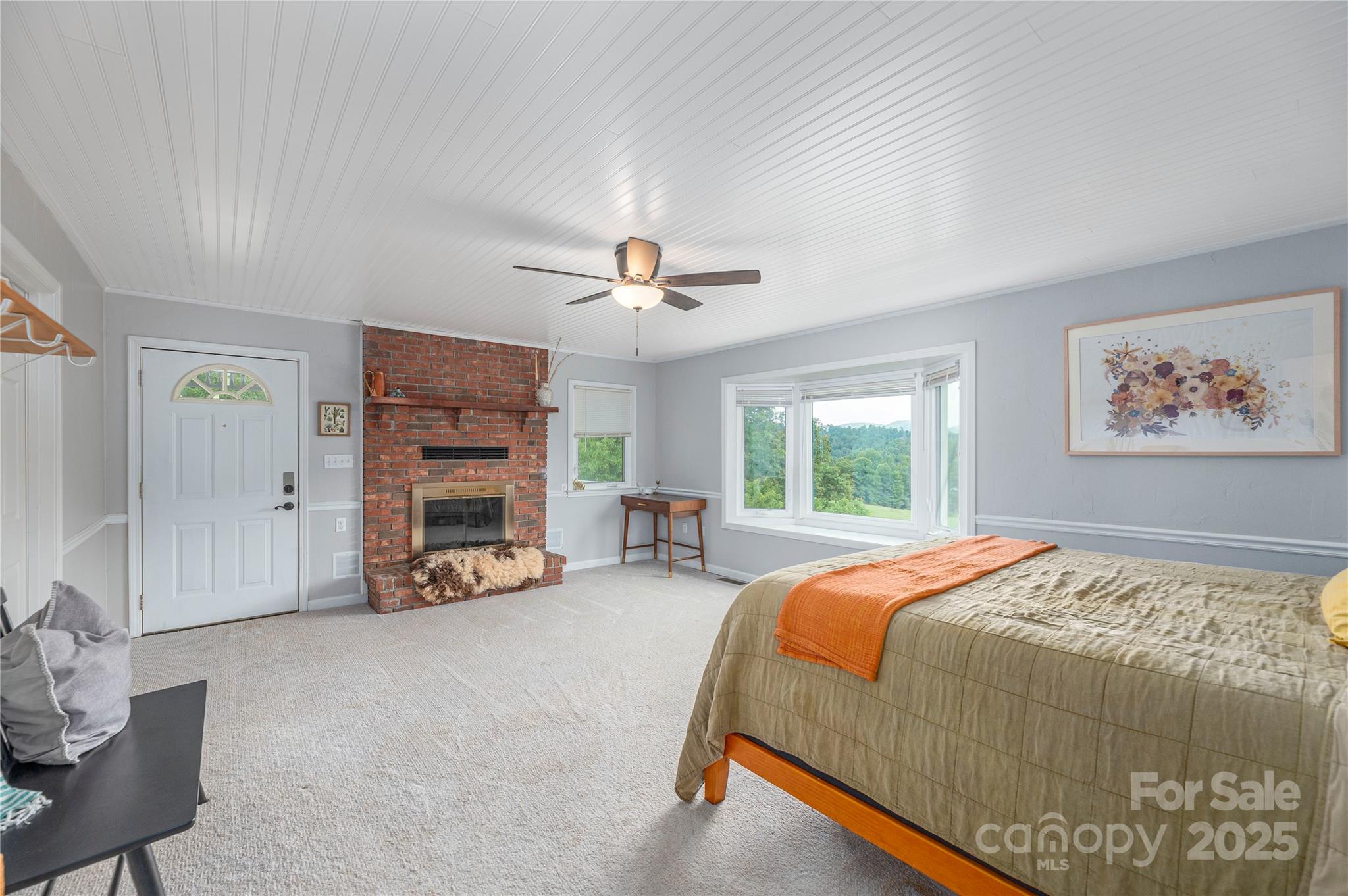 1304 Souther Road Old Fort, NC 28762 - Photo 19 of 48 a bed room with a bed and a large window