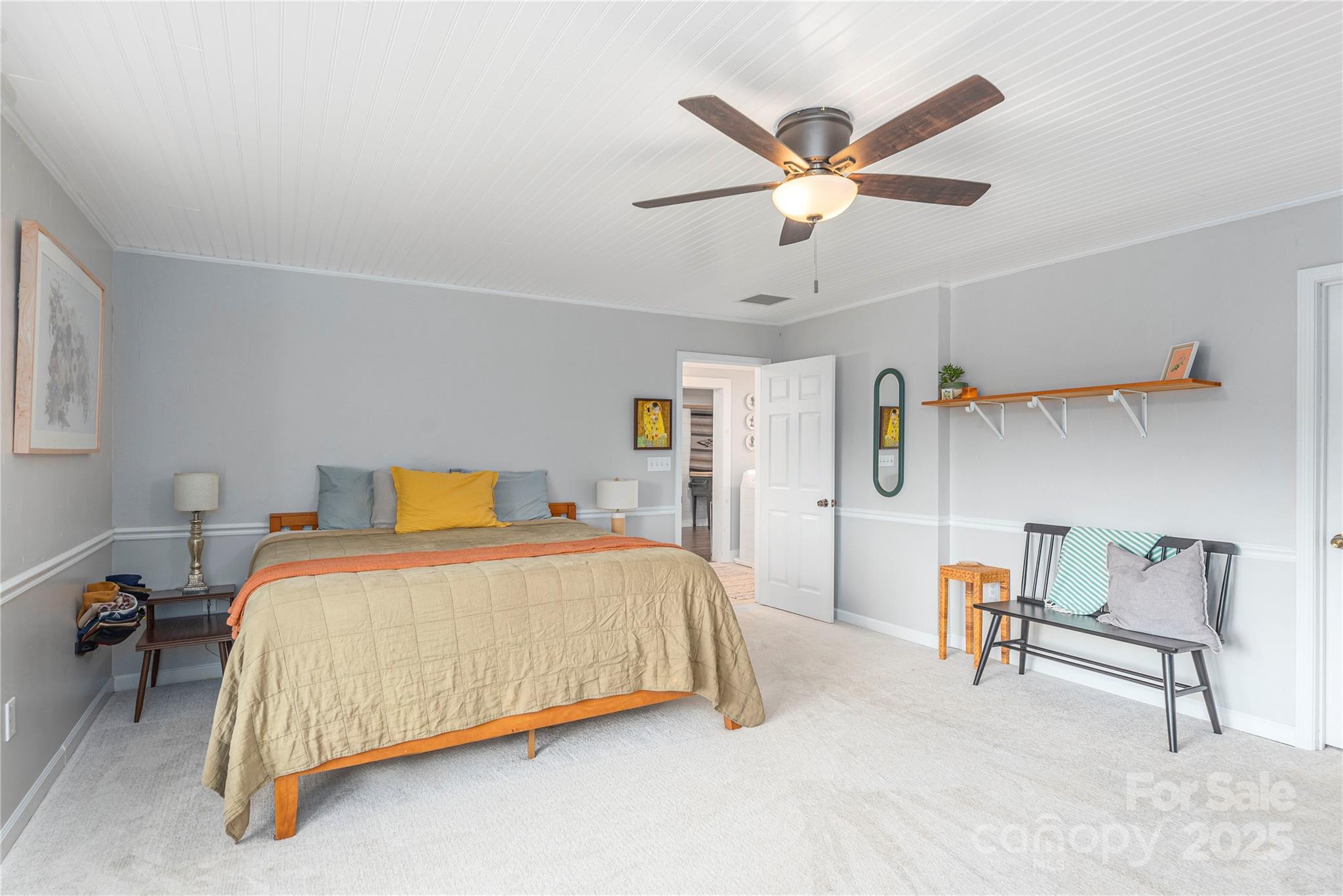 1304 Souther Road Old Fort, NC 28762 - Photo 20 of 48 a bedroom with a bed and a ceiling fan
